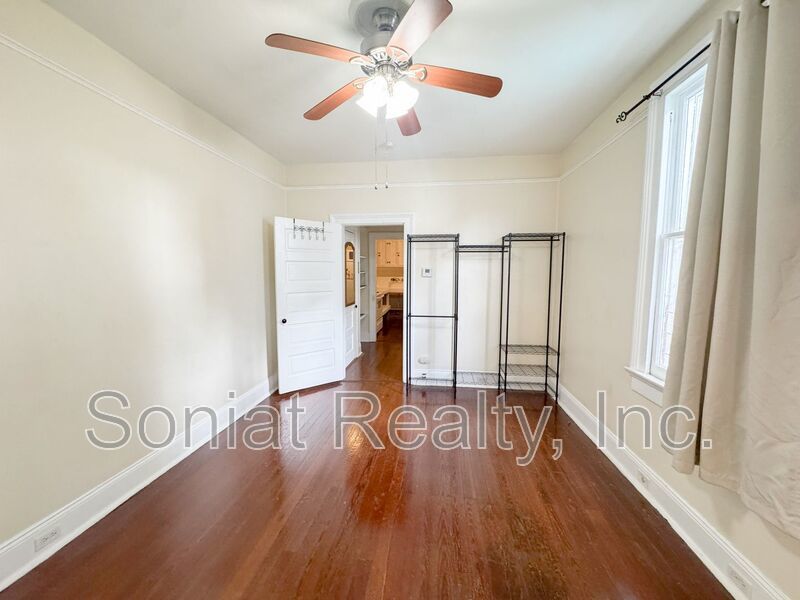 Charming Uptown Shotgun with Spacious Backyard property image