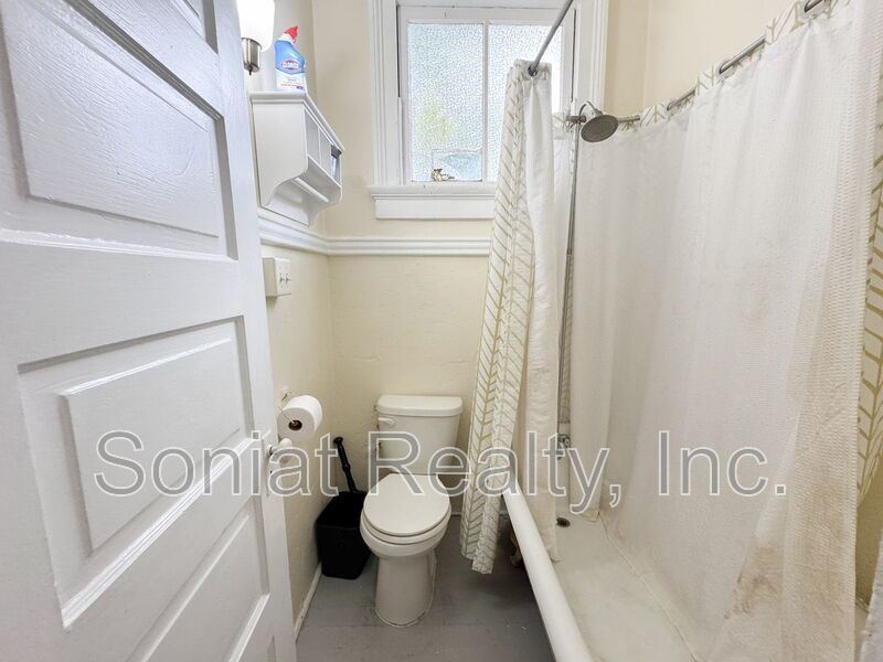 Charming Uptown Shotgun with Spacious Backyard property image